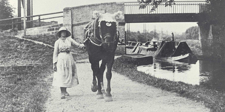 Lady and horse towpath