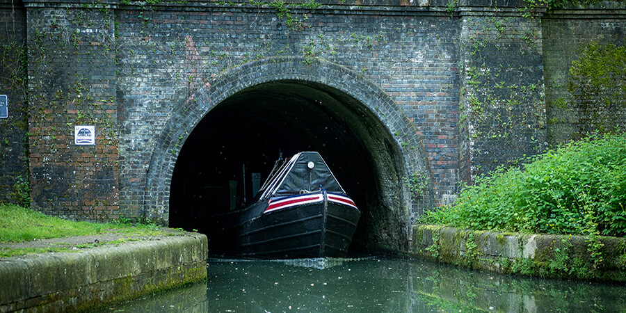 Boat coming out of Blisworth Tunnel, Stoke Bruerne