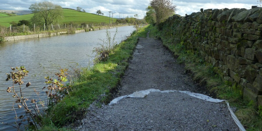 Gravel being surfaced on towpath