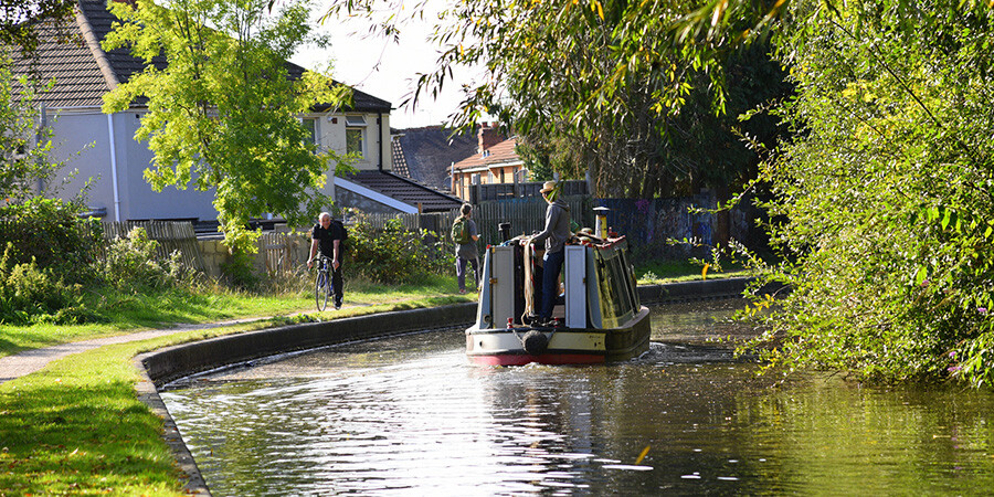 Boating and cycling on the Coventry Canal