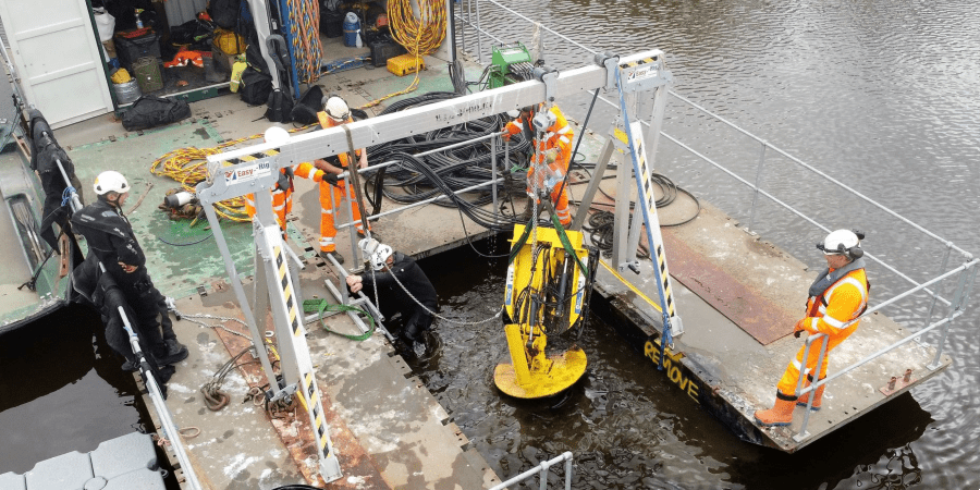 Robot being lowered into water