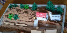 Model canal in sand tray
