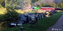 Narrowboat and steam train at Consall forge