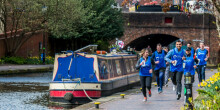 Group runners on the towpath
