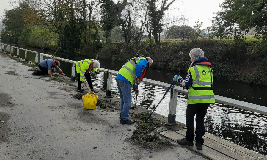 Volunteers weeding the drive at Apperley Bridge, Leeds &amp;amp; Liverpool Canal by Dianne Green